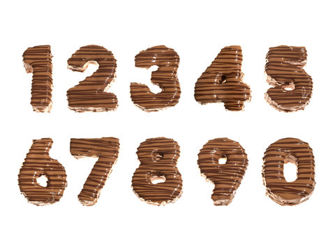 Kleine Kuchen als Zahlen aus Schokolade - Freigestellt