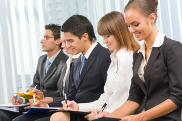 Photo of businesspeople or students at conference