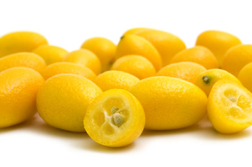 fresh kumquat on white background