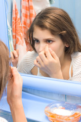 Teen girl in bathroom