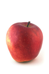 The ripe juicy red apple. Isolation on white.