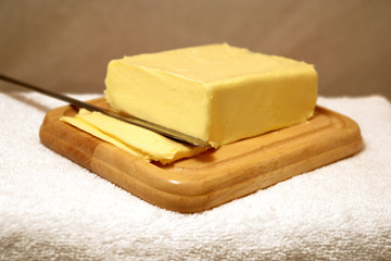 Butter cut on wood plate