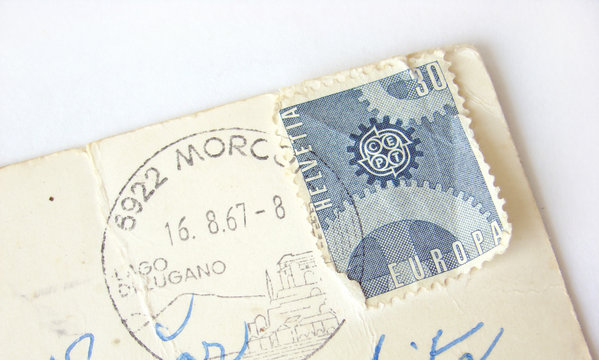 Helvetia (Switzerland) postage stamp on postcard