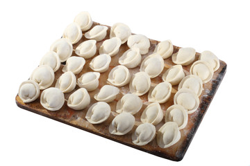 Russian pelmeni on a board