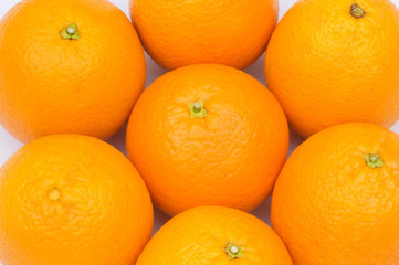 Close up of many oranges on the market