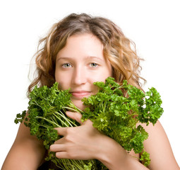 Young woman with fresh parsley
