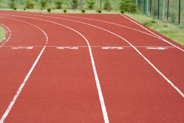 lanes of a red race track