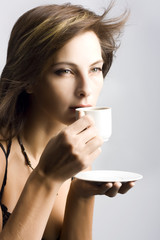 Young woman drinking coffee - 10862285
