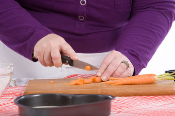 Fototapeta na wymiar Chopping carrots