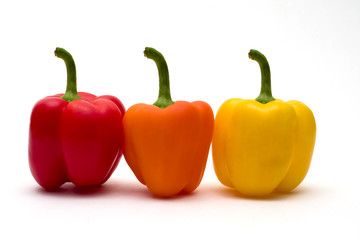 Three peppers on white