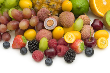 exotic fruits and berries on white background