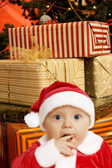 baby santa with presents