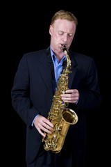 Fototapeta na wymiar jazz musician playing saxophone