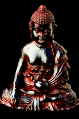 Fototapeta premium Bouddha sur fond sombre