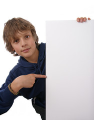 Boy holding blank white sign