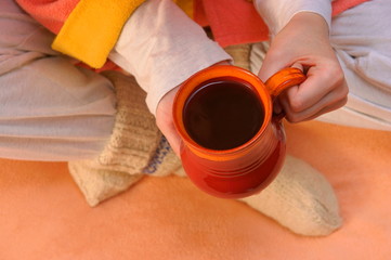 Hands with winter cup