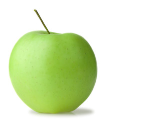 green ripe apple. It is isolated on a white background