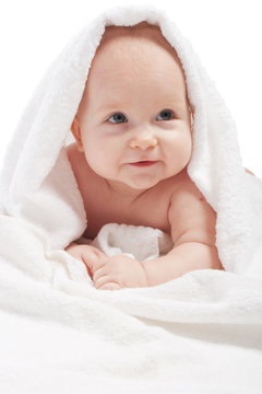 Baby lying on a towel