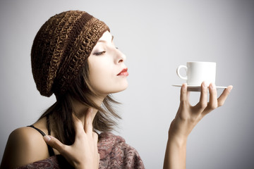 Young woman drinking coffee - 10903278