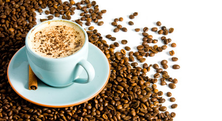 cappuccino on white background with coffee beans