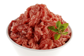 Raw minced pork isolated on white background