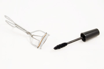 Eyelash curler and mascara brush