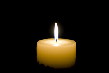 Close-up view of the candle in the night