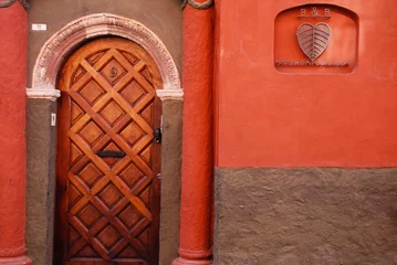 Gordijnen Rustic colorful door in Mexico © Robert Crum