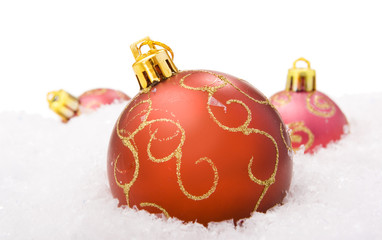 Christmas balls with snow isolated on white