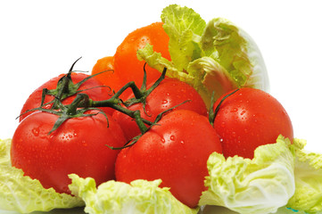 few tomatos with leaves cabbage