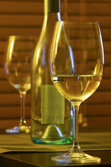 Closeup of wine glasses and bottle