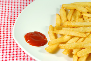 Salted french fries with ketchup