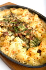 Beef home style - baked with a potato in cream.
