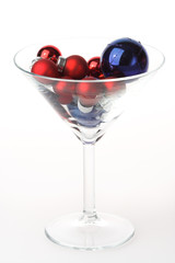 Martini glass with Christmas baubles