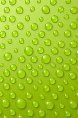 Drop of water on green board