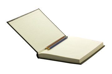 Open hardcover and empty notebook with two pencils on it