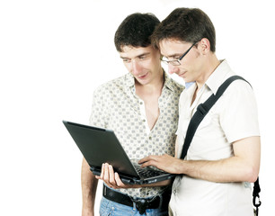 two young men with notebook
