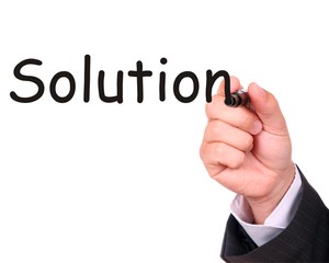 .Businessman hand drawing word solution