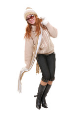 Fototapeta premium A beautiful girl in winter clothing