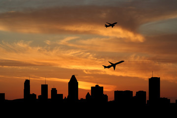 Planes departing Montreal at sunset