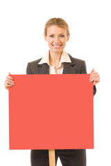Businesswoman standing with red signboard, isolated