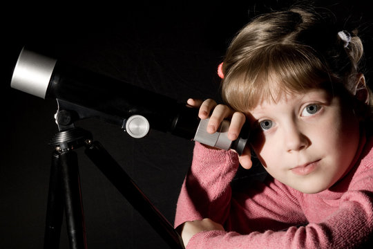 Girl and telescope