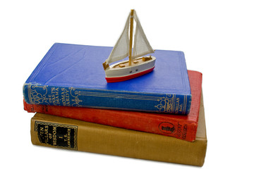 Toy boat and books