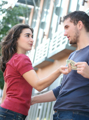 Young Couple Fighting, Arguing over Money
