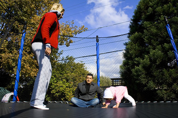 Family on the Trampoline Playing