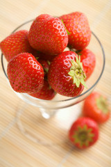 ripe strawberries in glass bowl