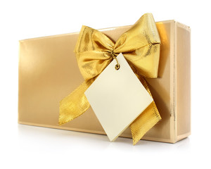 gift box with gold bow and blank label