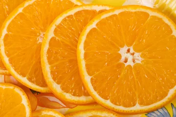 Photo sur Plexiglas Tranches de fruits Plusieurs morceaux d& 39 orange
