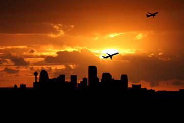 Planes departing Calgary at sunset