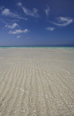 Whispy clouds over paradise